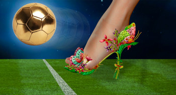 gold soccer ball and butterfly shoe